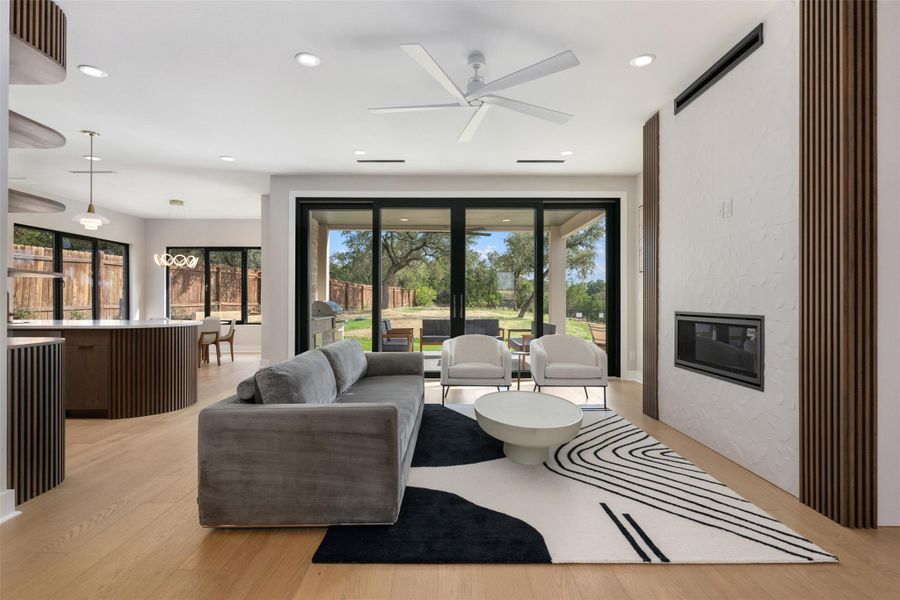 Family room open to kitchen and dining with Rehau sliding doors to covered patio. Family room open to kitchen and dining with Rehau sliding doors to covered patio.