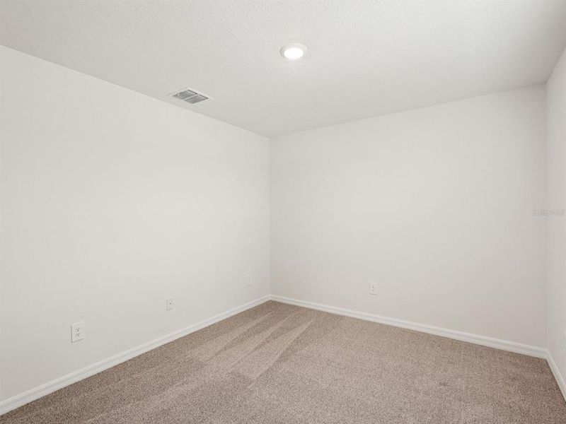 Spacious, unfurnished interior of a new home in Coasterra - Premier Series, Palmetto (Image 34).