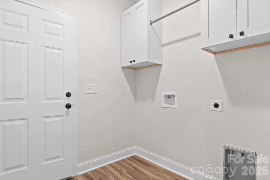 Laundry room off garage entrance