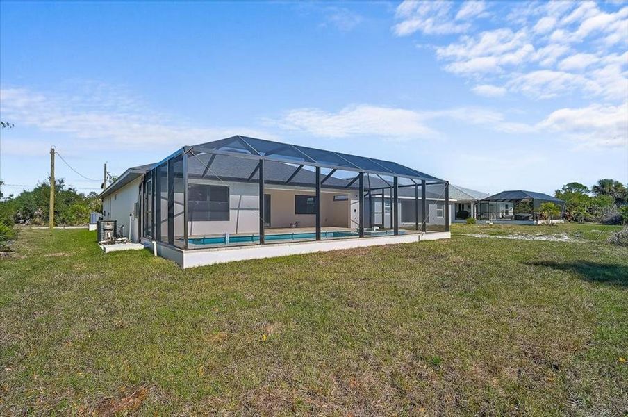 Exterior details and patio area of a home in , Rotonda West (Image 18).