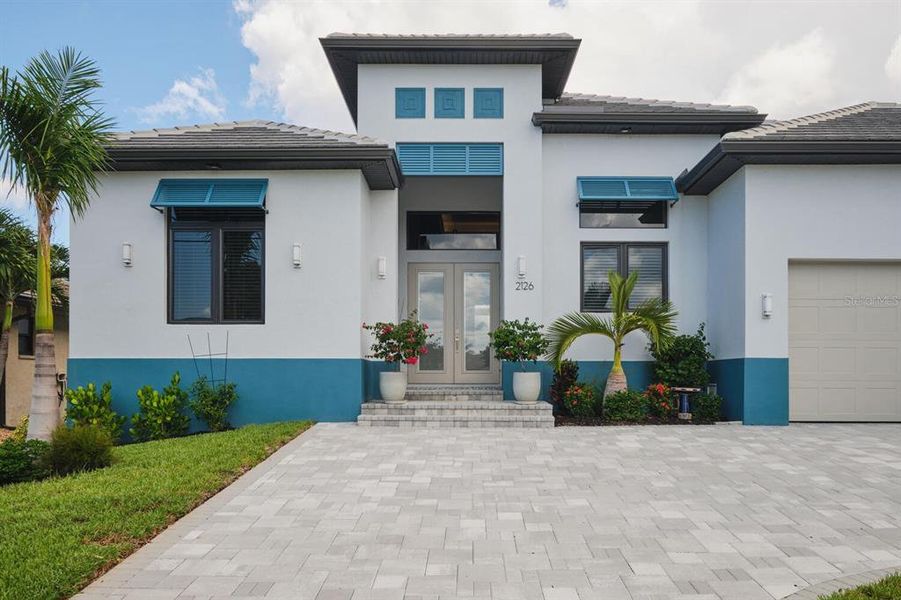Front exterior of a new home in , Punta Gorda, FL, highlighting curb appeal (Image 20).