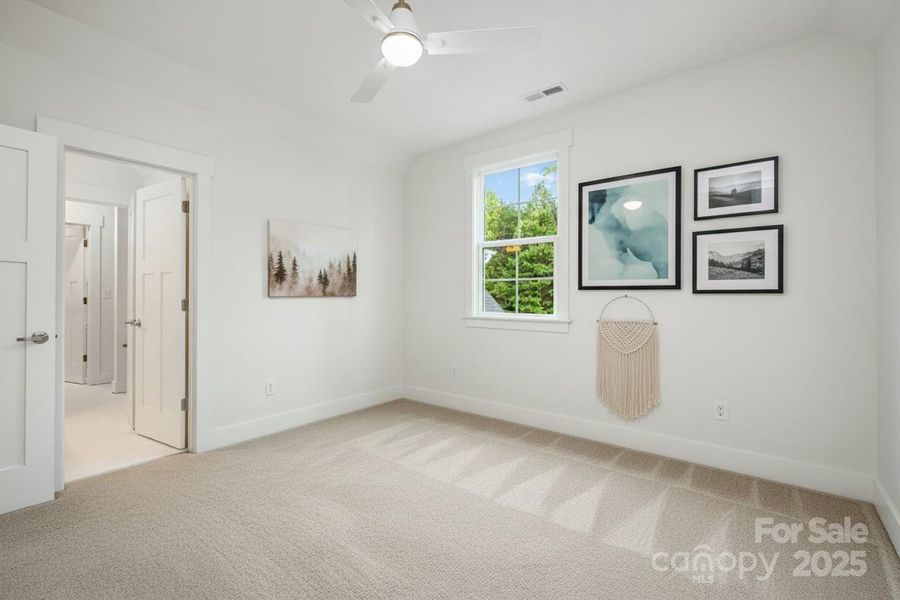 Second upstairs bedroom (virtually staged) Second upstairs bedroom (virtually staged)