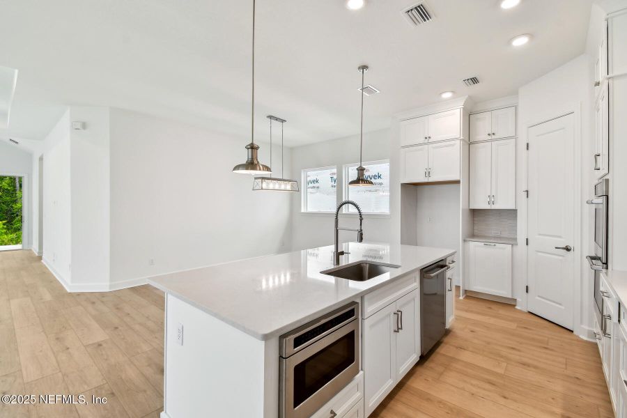Furnished interior view inside a new home in Reflections 40' Front Load, Ponte Vedra (Image 11).