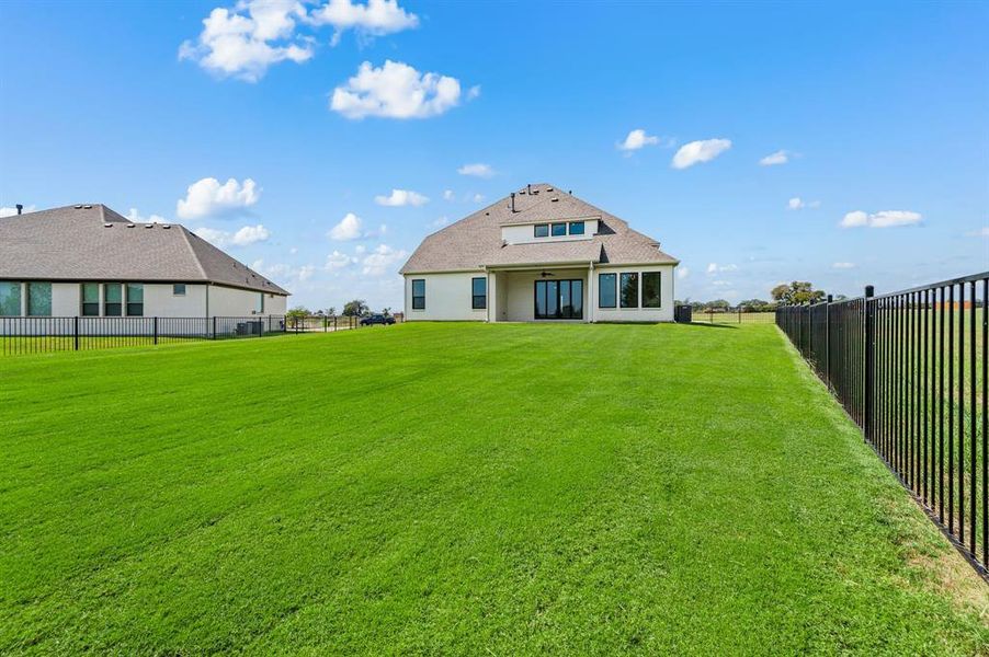 Exterior details and patio area of a home in Highland Oaks, Boyd (Image 15). Exterior details and patio area of a home in Highland Oaks, Boyd (Image 15).