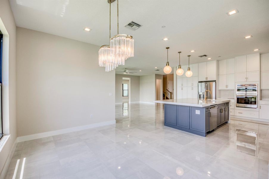 Furnished interior view inside a new home in Apex at Avenir, Palm Beach Gardens (Image 27).