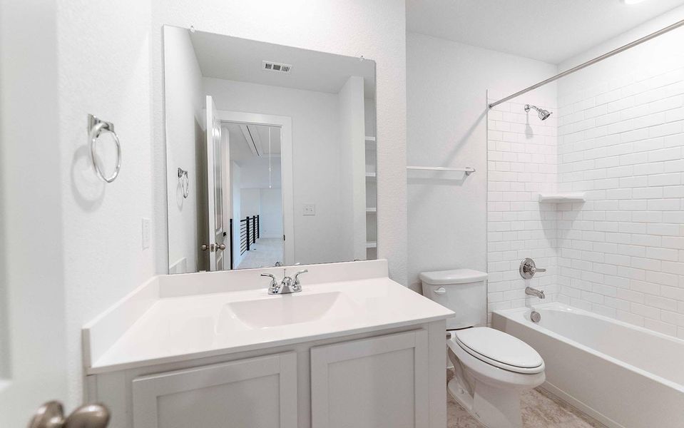 Full bath featuring vanity and tub / shower combination Full bath featuring vanity and tub / shower combination