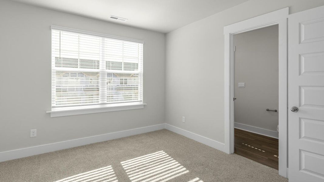 Spacious, unfurnished interior of a new home in The Palms at Indigo Preserve Townhomes, Leland (Image 29). Spacious, unfurnished interior of a new home in The Palms at Indigo Preserve Townhomes, Leland (Image 29).