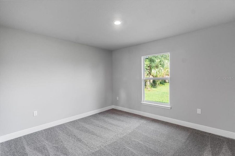 Spacious, unfurnished interior of a new home in , Port Charlotte (Image 21).