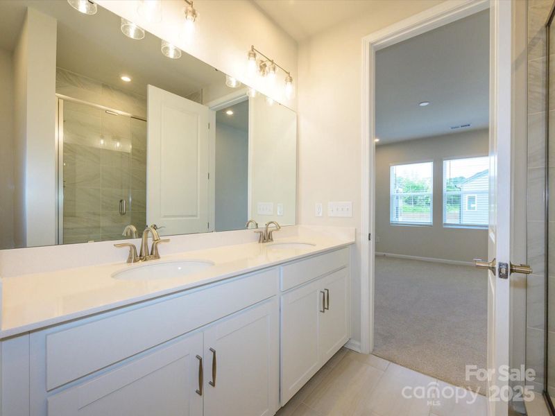 Primary En Suite Bath with Dual Vanity.