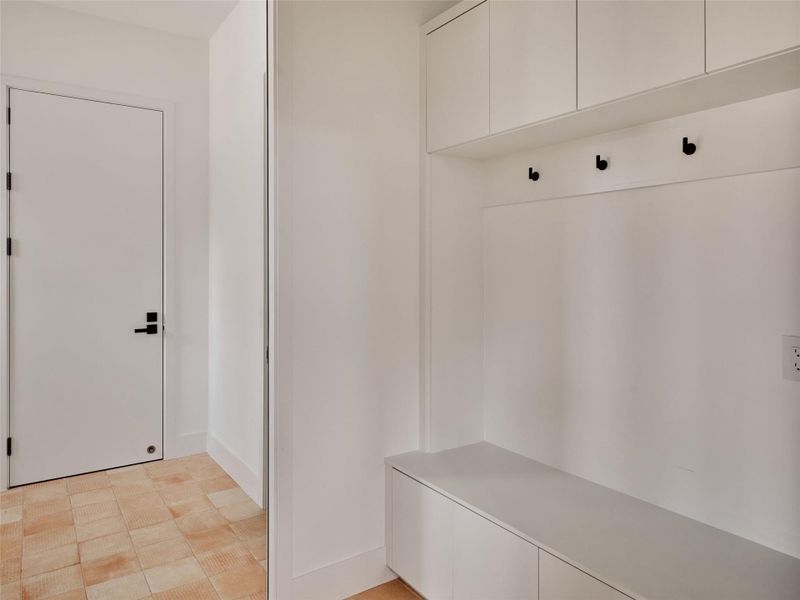 Mudroom featuring baseboards