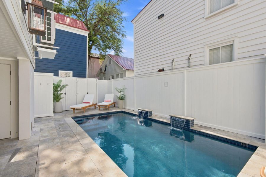 Exterior details and patio area of a home in , Charleston (Image 38).