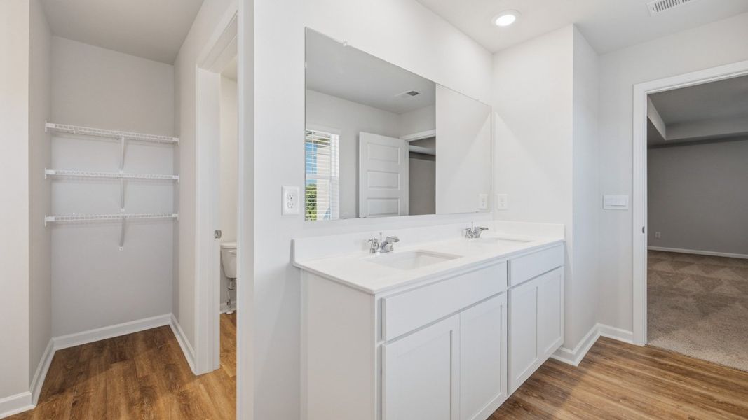 Furnished interior view inside a new home in The Reserve at Calcutta, Stockbridge (Image 10).