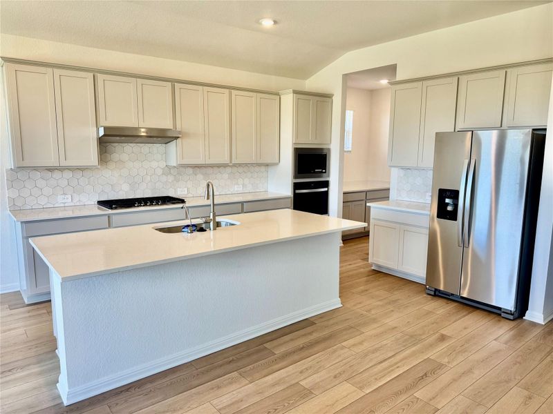 Furnished interior view inside a new home in Big Sky Ranch - Executive Collection, Dripping Springs (Image 4).
