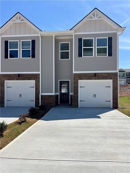 Front exterior of a new home in Azalea Hills, Temple, GA, highlighting curb appeal (Image 1). Front exterior of a new home in Azalea Hills, Temple, GA, highlighting curb appeal (Image 1).