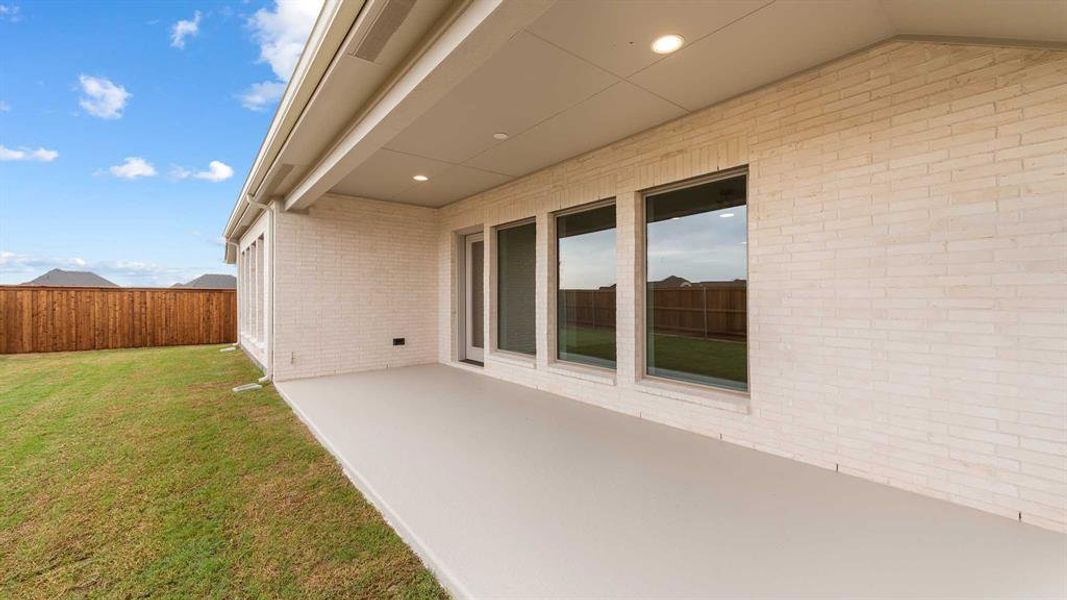 Exterior details and patio area of a home in Myrtle Creek 60', Waxahachie (Image 3). Exterior details and patio area of a home in Myrtle Creek 60', Waxahachie (Image 3).