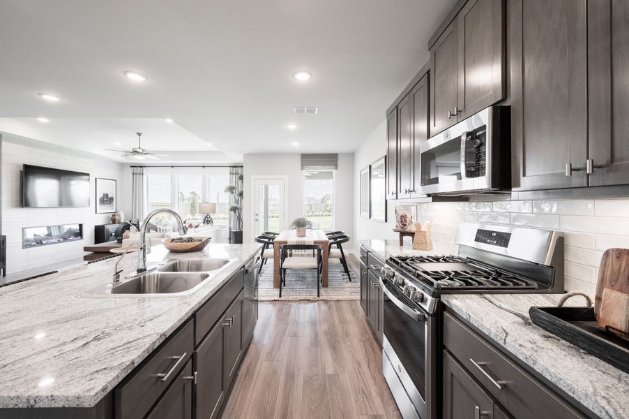 Representative furnished interior of a home built from the Yellowstar by Tri Pointe Homes in Mason Woods, Cypress (Image 4).