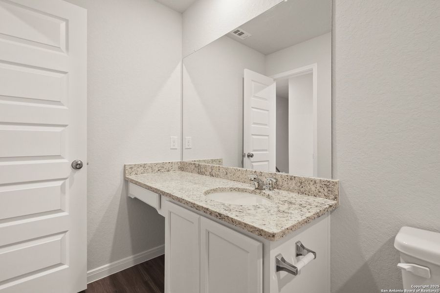 Furnished interior view inside a new home in Abbott Place, St. Hedwig (Image 10).