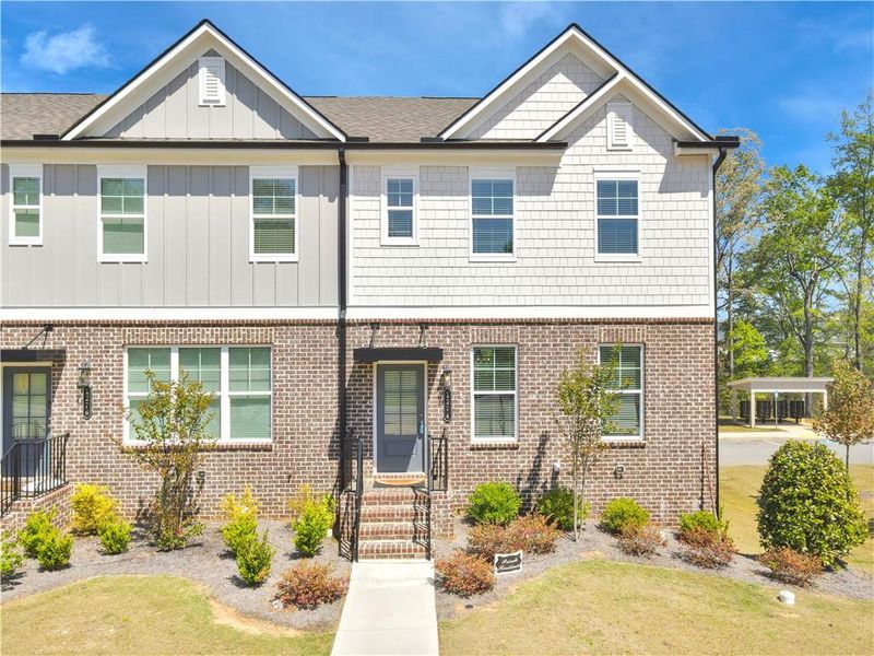 Front exterior of a new home in , Sugar Hill, GA, highlighting curb appeal (Image 2). Front exterior of a new home in , Sugar Hill, GA, highlighting curb appeal (Image 2).