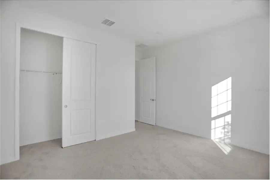Spacious, unfurnished interior of a new home in Turnleaf, Punta Gorda (Image 21). Spacious, unfurnished interior of a new home in Turnleaf, Punta Gorda (Image 21).
