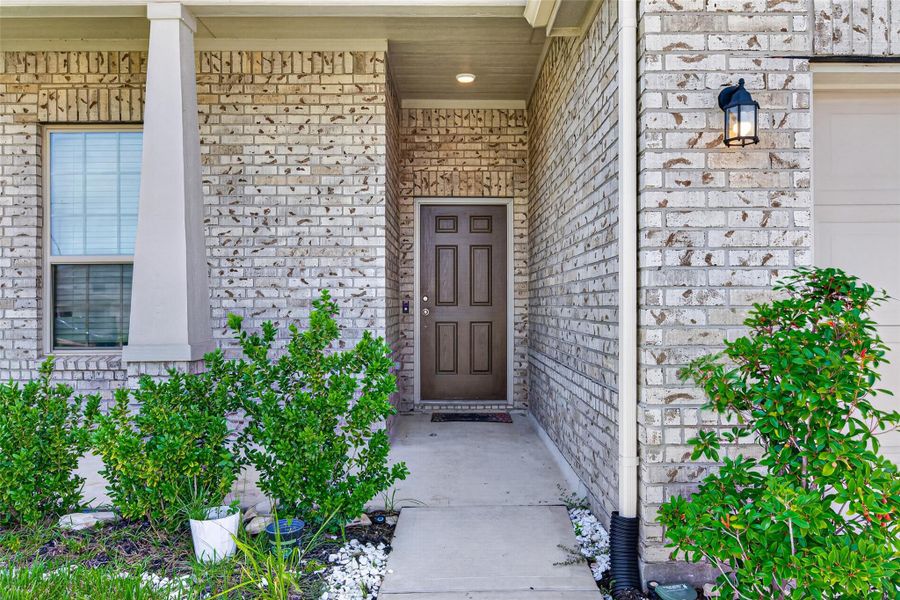 Exterior details and patio area of a home in Marvida, Cypress (Image 32).