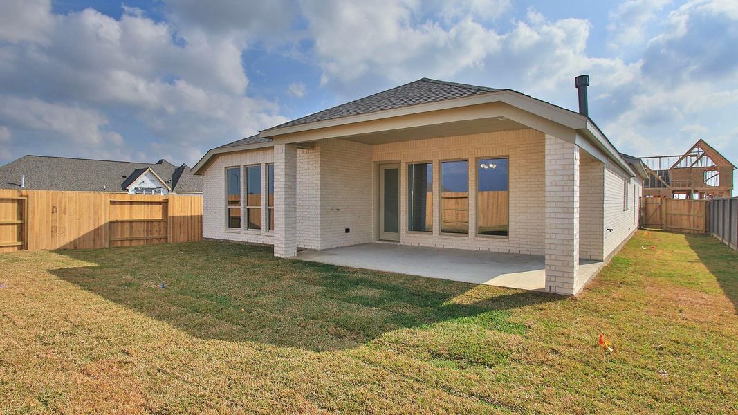 Exterior details and patio area of a home in The Grand Prairie 50', Hockley (Image 3).