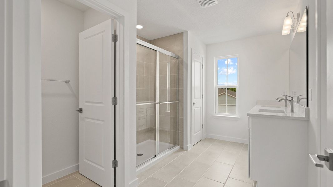 Highbourne Second Floor Primary en Suite Bath by DRB Homes in Willowbrook North located in Winter Haven, FL. Highbourne Second Floor Primary en Suite Bath by DRB Homes in Willowbrook North located in Winter Haven, FL.
