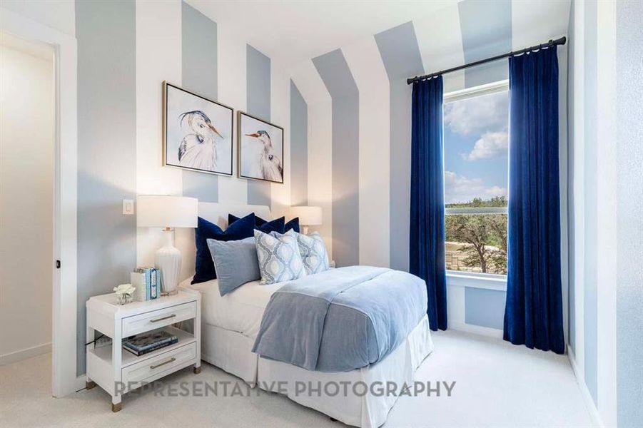 Bedroom with light carpet