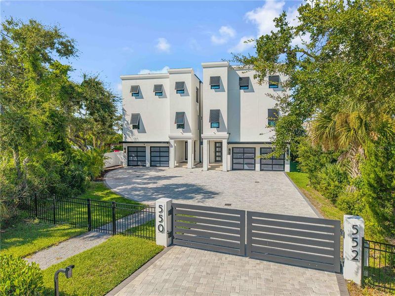 Front exterior of a new home in , New Smyrna Beach, FL, highlighting curb appeal (Image 21). Front exterior of a new home in , New Smyrna Beach, FL, highlighting curb appeal (Image 21).