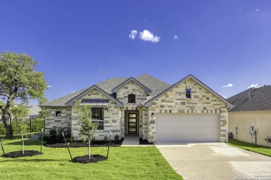 Front exterior of a new home in , Kerrville, TX, highlighting curb appeal (Image 1).