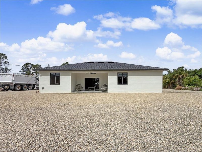 Exterior details and patio area of a home in , Lehigh Acres (Image 3).