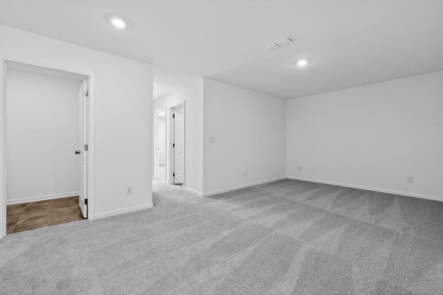 Spacious, unfurnished interior of a new home in Weatherfield, Buford (Image 36).