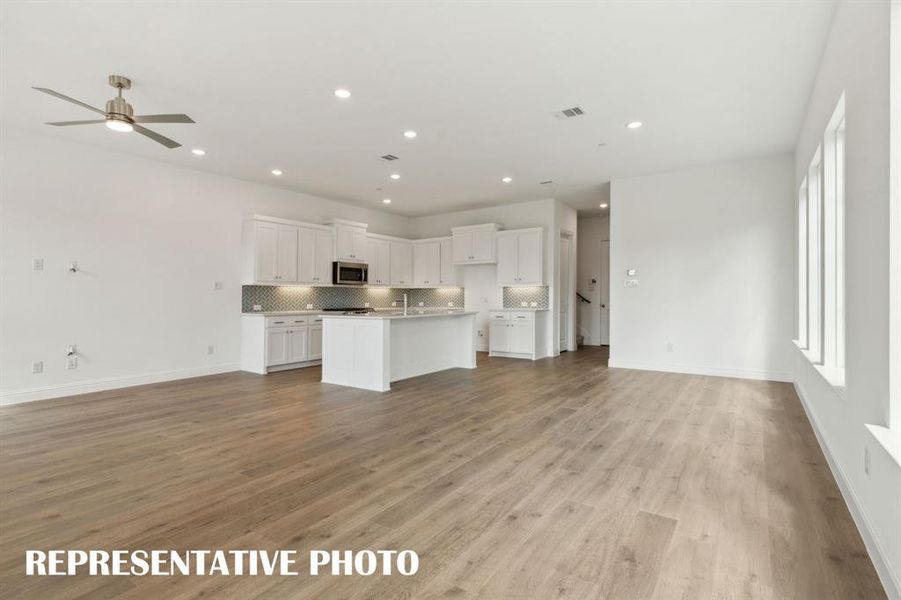 Open and flowing, our Justin floor plan was designed for entertaining!  REPRESENTATIVE PHOTO