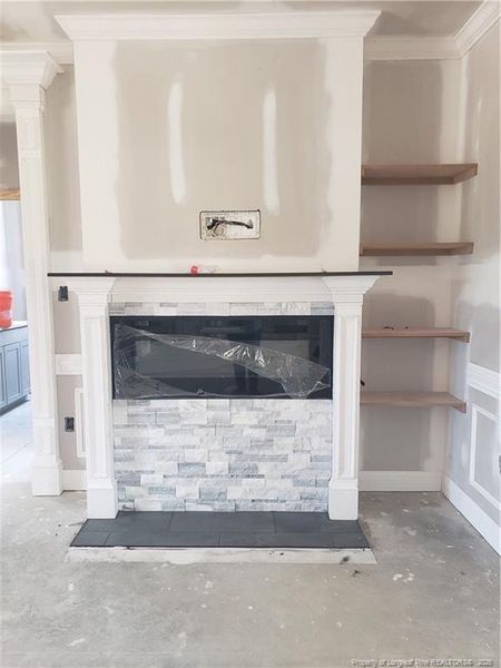 Built in beside fireplace Built in beside fireplace