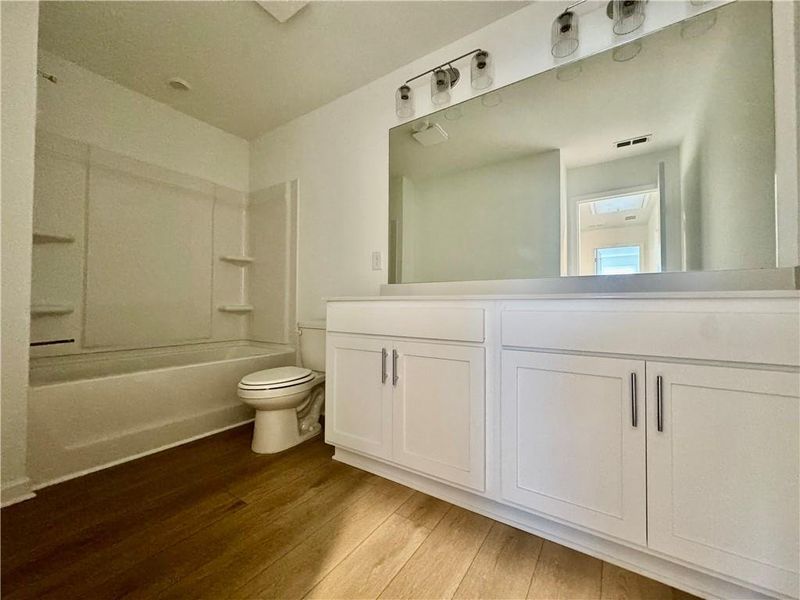 Furnished interior view inside a new home in Eastlyn Crossing, Flowery Branch (Image 9).
