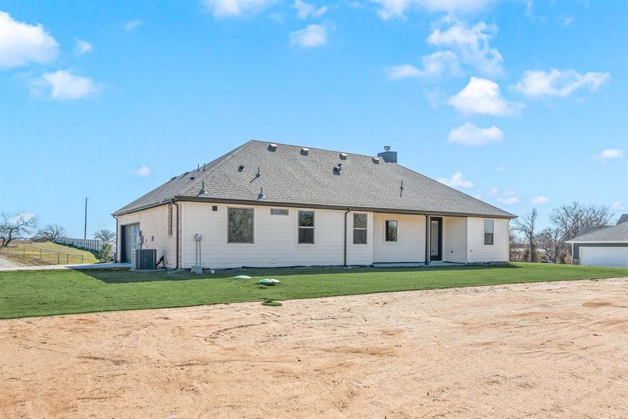 Front exterior of a new home in Saddleback Estates, Boyd, TX, highlighting curb appeal (Image 18).