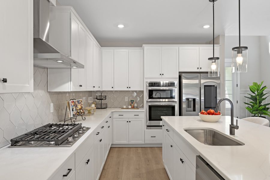 Representative furnished interior of a home built from the Tillman by Hunter Quinn Homes in Landing at Clemson Marina, Seneca (Image 6).