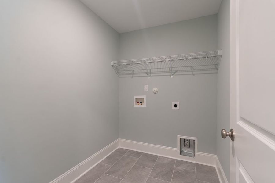 Representative unfurnished interior of a home built from the Salt Marsh by Bill Clark Homes in Osprey Landing, Southport (Image 20).