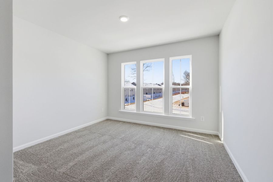 Spacious, unfurnished interior of a new home in Poets Walk, Whitsett (Image 24).