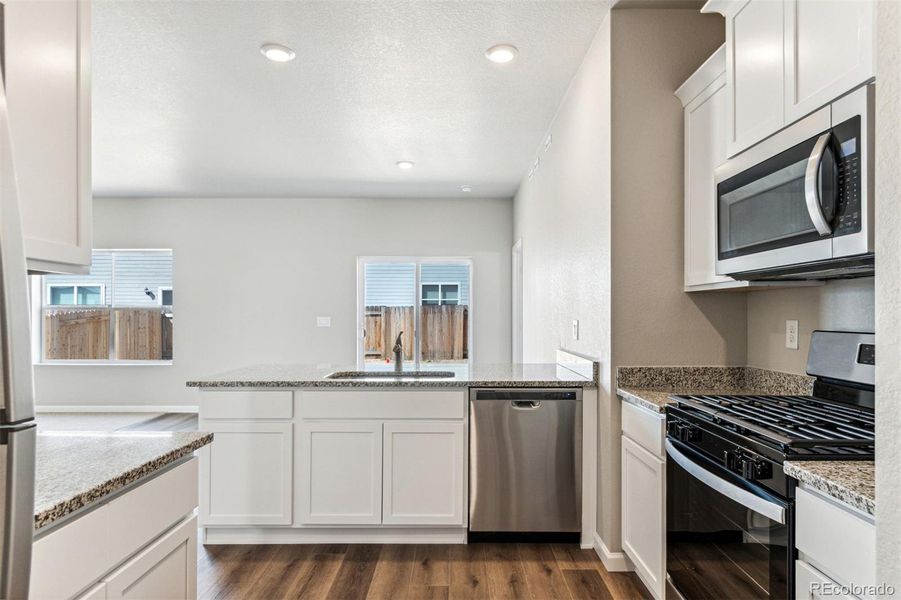 Furnished interior view inside a new home in Second Creek Farm, Commerce City (Image 7).