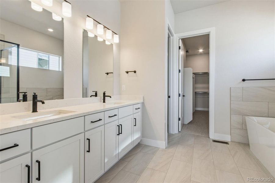 Furnished interior view inside a new home in Kitchel Lake at Serratoga Falls, Timnath (Image 8).