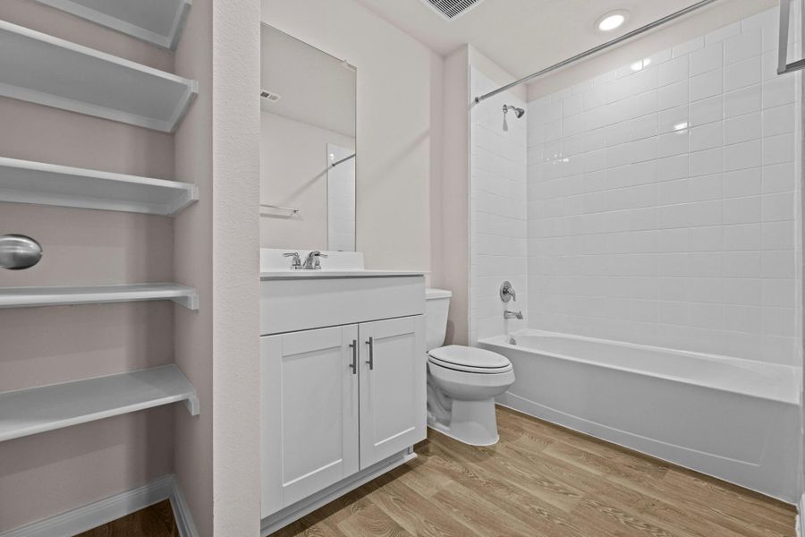 Furnished interior view inside a new home in Whisper South, San Marcos (Image 6).