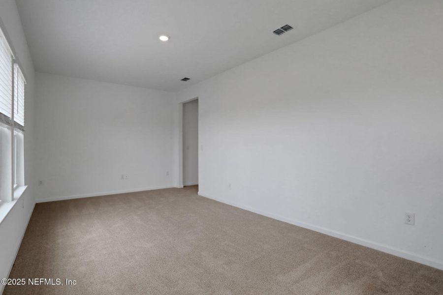 Spacious, unfurnished interior of a new home in TrailMark, St. Augustine (Image 26).
