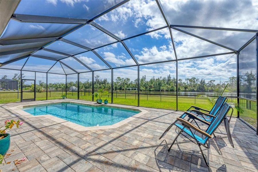 Exterior details and patio area of a home in , Port Charlotte (Image 24).