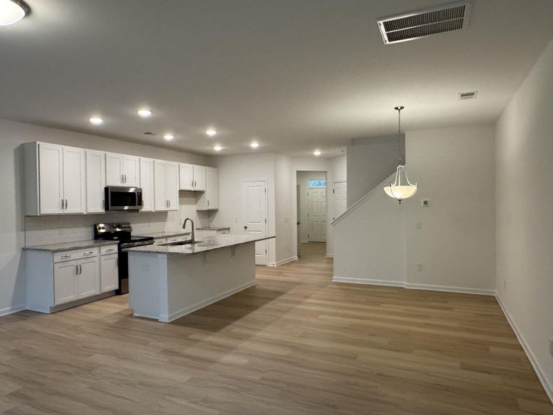Furnished interior view inside a new home in East Main Townes, Spartanburg (Image 4).