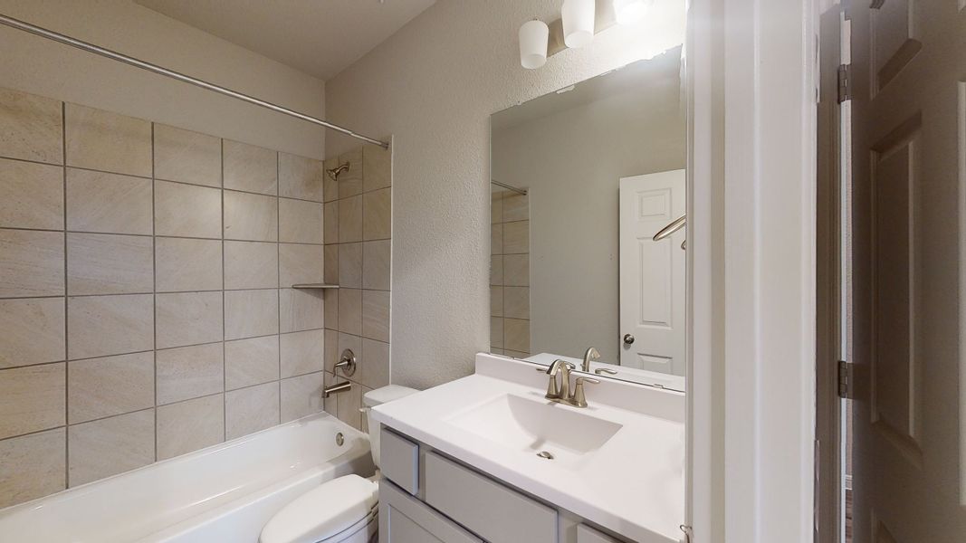 Representative furnished interior of a home built from the Floor Plan 2175 by Colina Homes in Grand Magnolia, Magnolia (Image 11).
