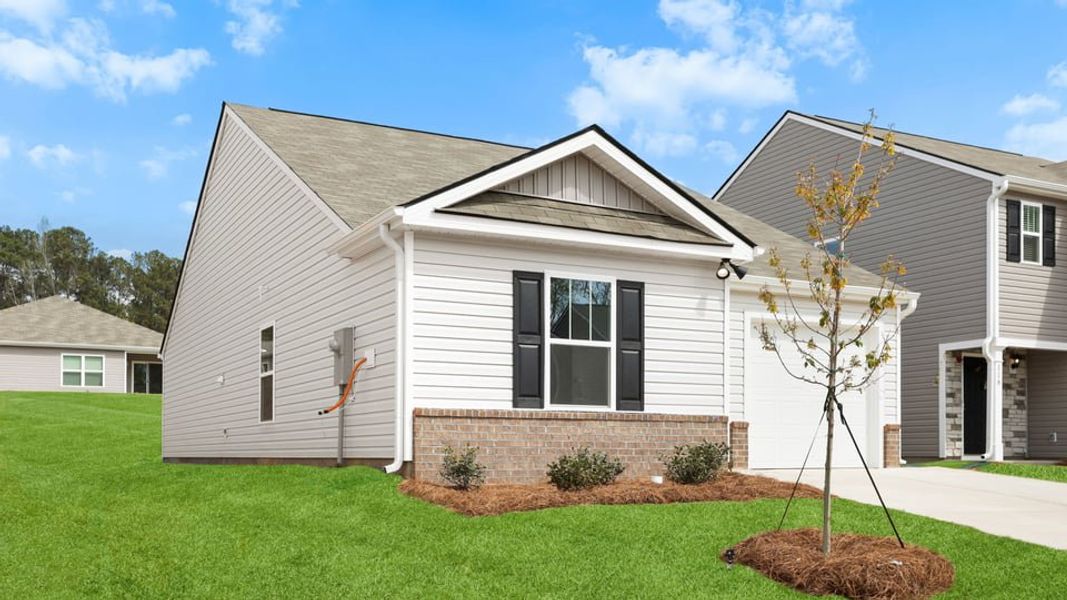 Front exterior of a new home in Durbin Meadows, Fountain Inn, SC, highlighting curb appeal (Image 17).