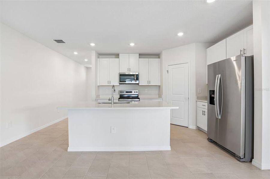 Furnished interior view inside a new home in Benton Hills - Classic Series, Brooksville (Image 14).
