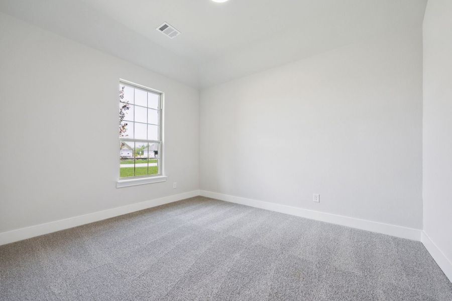 Representative unfurnished interior of a home built from the Belmont by Centre Living Homes in Ellis Ranch Estates, Waxahachie (Image 32).