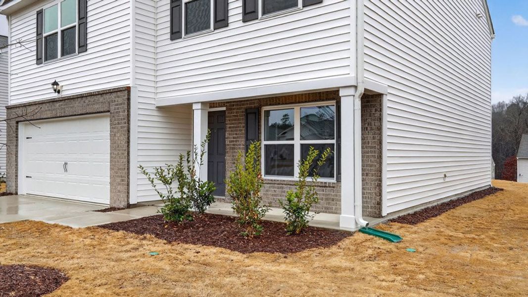 Exterior details and patio area of a home in Wilson's Ridge, Wilson's Mills (Image 4).
