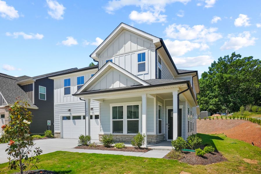 Front exterior of a new home in Elmbrook, Indian Trail, NC, highlighting curb appeal (Image 1). Front exterior of a new home in Elmbrook, Indian Trail, NC, highlighting curb appeal (Image 1).